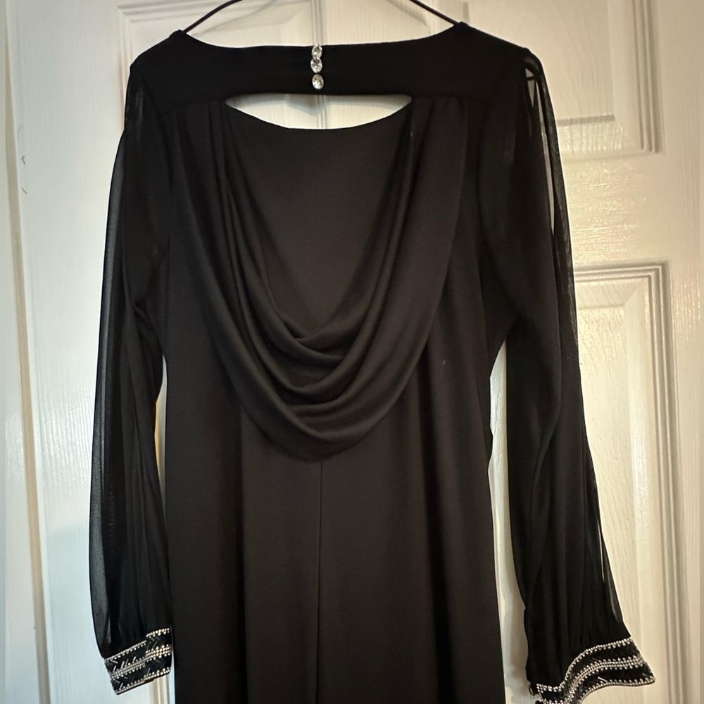 Nice elegant black dress in size small stretch “for a wedding party”